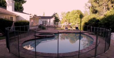 photo of a pool with fencing around it.