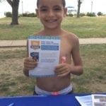 Boy standing with his pledge