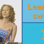 woman playing guitar with a graphic that says 1, learn to swim.