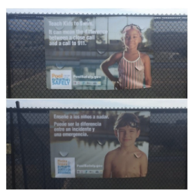 2 billboards with kids near a pool