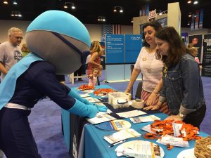 Medley the mascot taking the Pool Safely Pledge