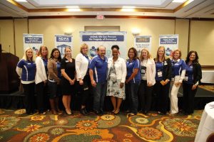 A group of women with 1 man at the NDPA conference