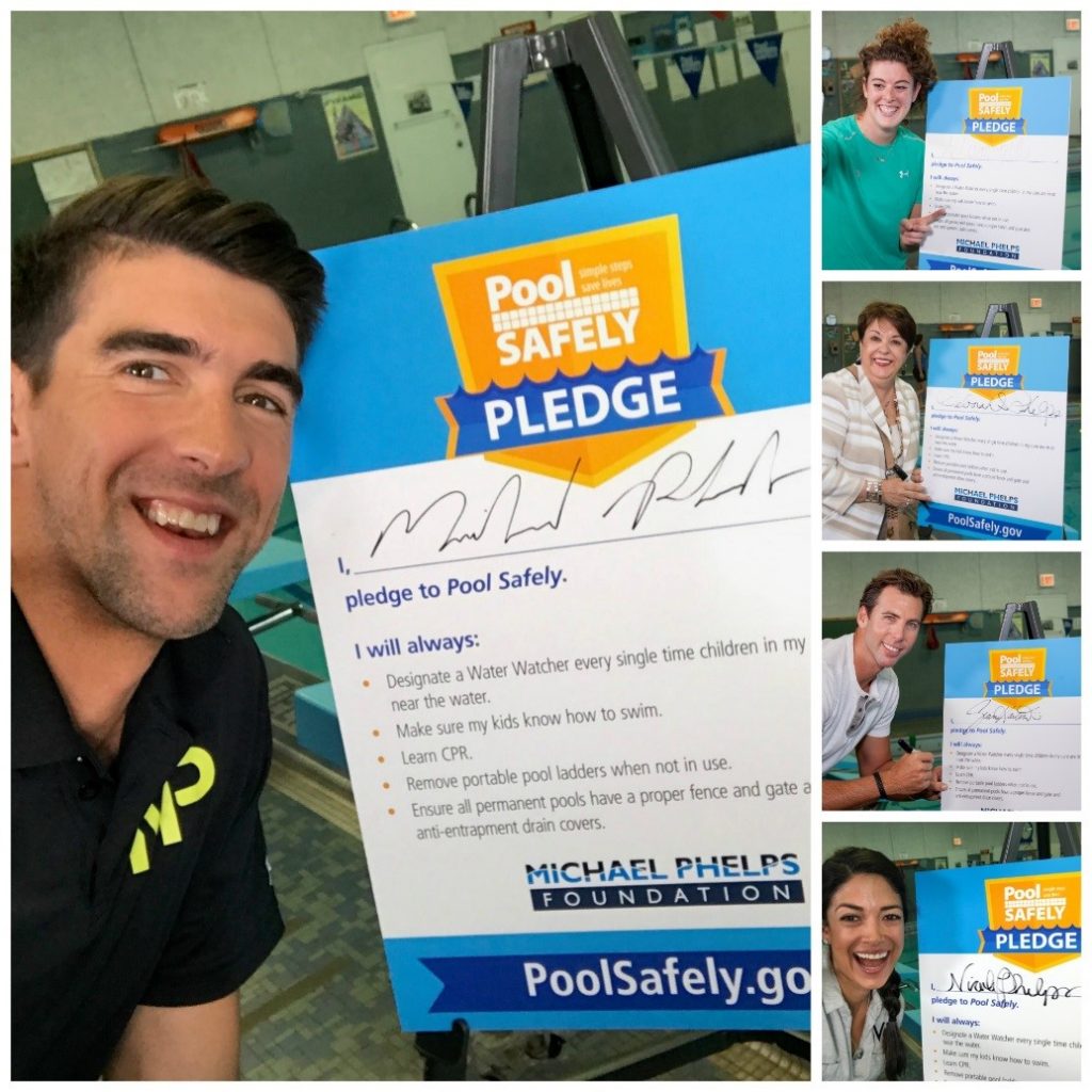 Michael Phelps and friends with their signed pool safely pledge