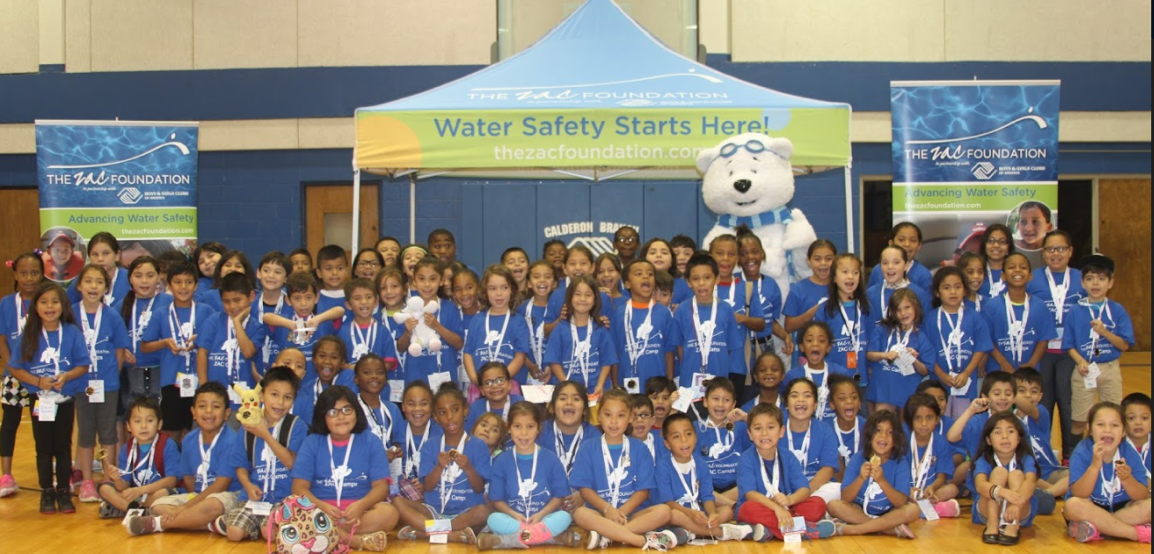 Campers in a gym for Water safety.