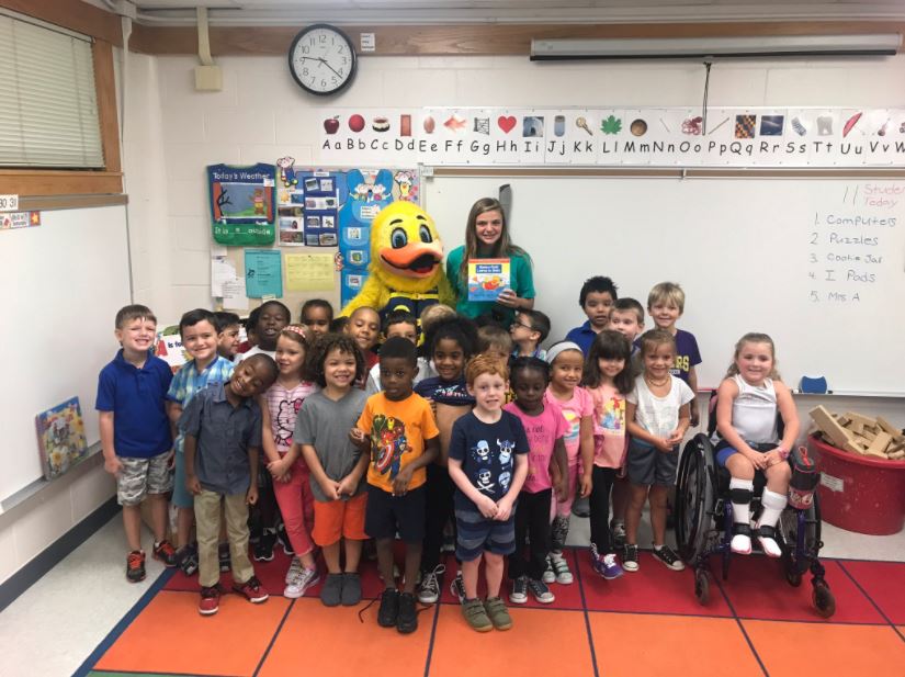 group of children in a classroom.