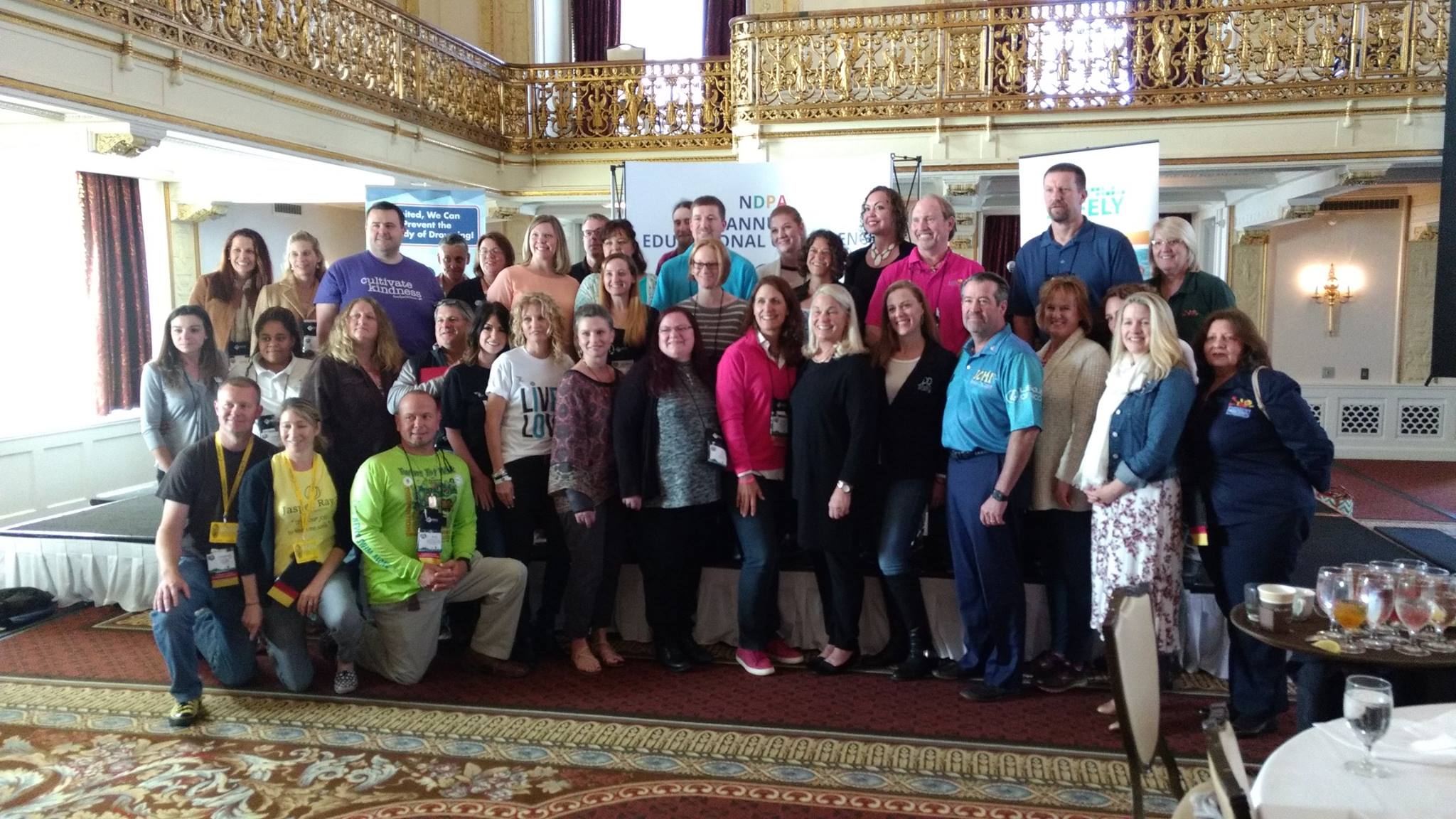 a large group of people smiling.