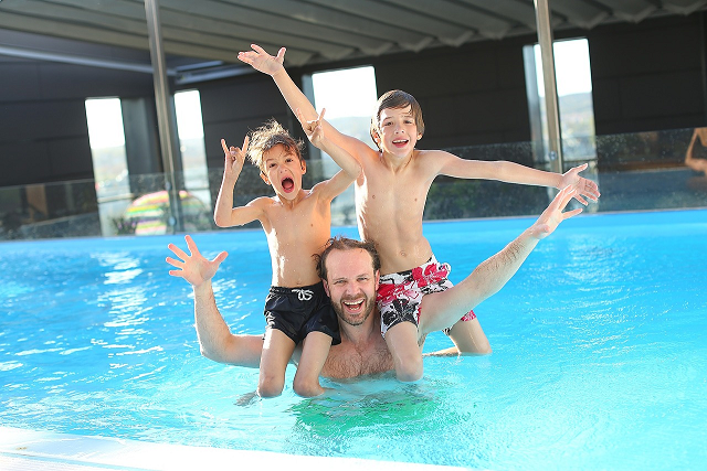 Dad and Kids Swimming.