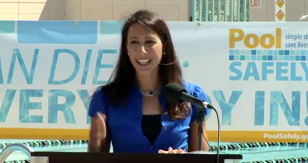 closeup of a woman at a podium