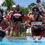 lifeguards around a pool
